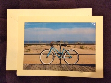 note card featuring a bicycle on the boardwalk in Ocean Grove, NJ. 